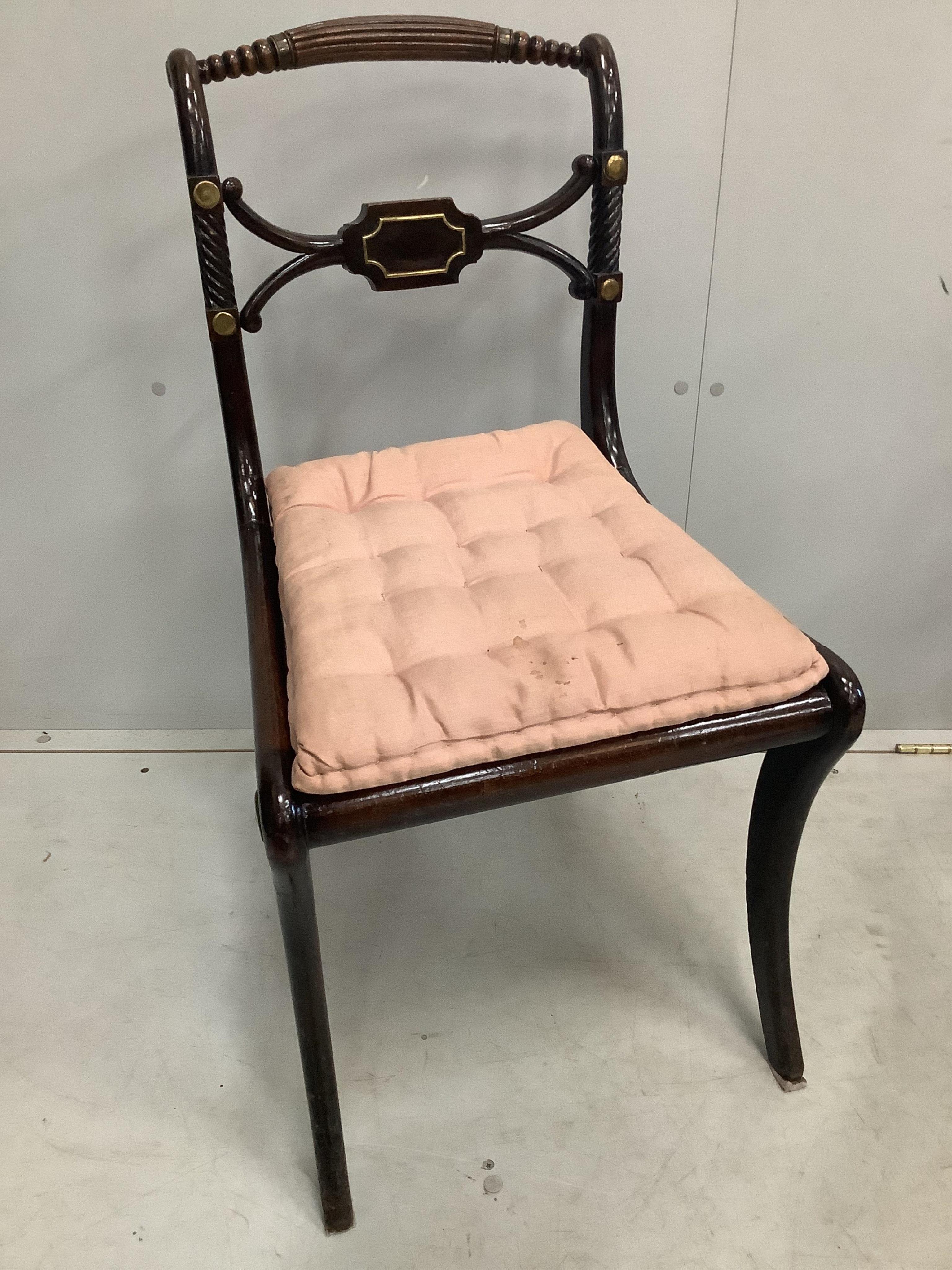 A set of six Regency brass mounted beech cane seat dining chairs